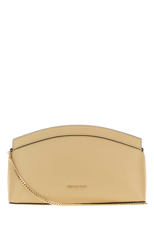 Michael By Michael Kors Dome Exterior: 100% Leather; Lining: 100% Fabric; Finishing: Golden metal clutch in beige