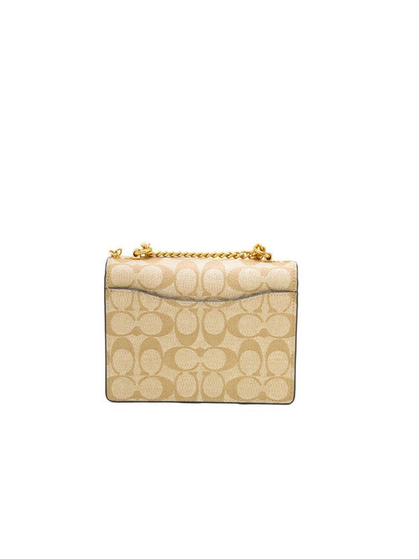 Coach Coated canvas and smooth leather crossbody bag in gold
