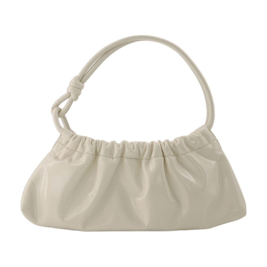 Nanushka Synthetic leather shoulder bag in beige