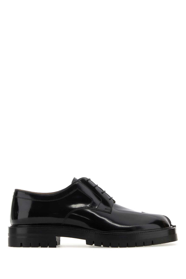 Maison Margiela Exterior: 100% Calf; Interior: 100% Lamb; Sole: Rubber loafer in black