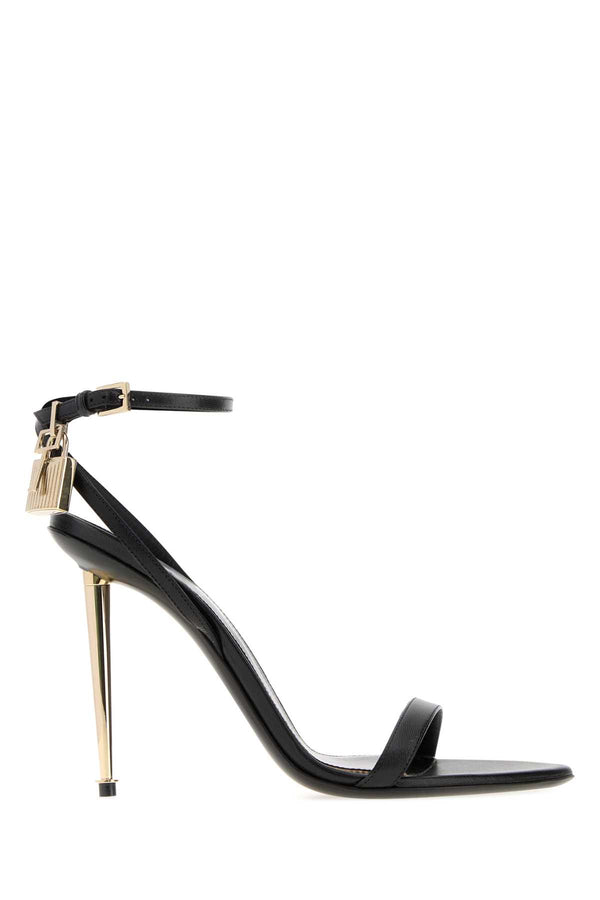 Tom Ford Exterior: 100% Ovine leather; Interior: 100% Leather; Sole: Leather sandal in black