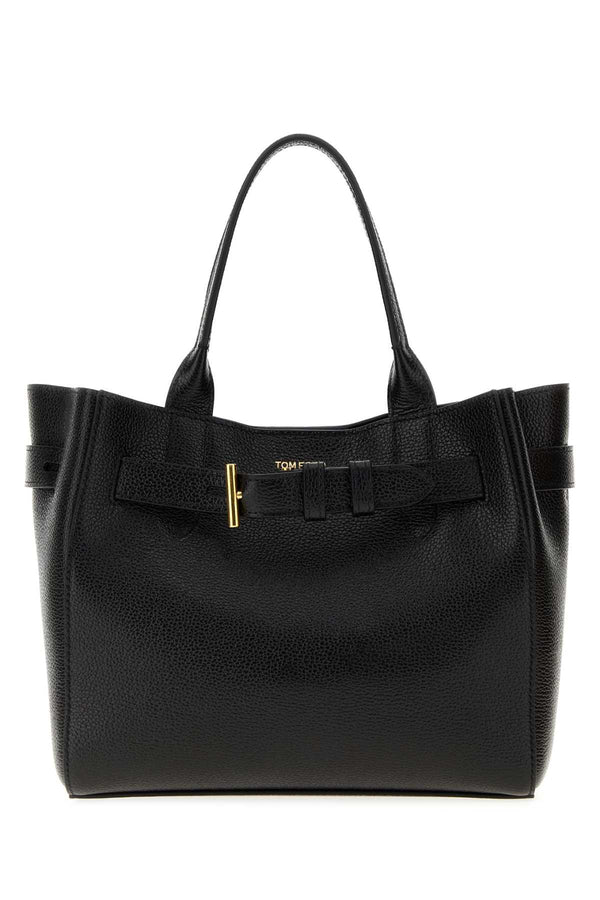 Tom Ford Exterior: 100% Bovine leather; Lining: 100% Polyester; Finishing: Golden metal shoulder bag in black