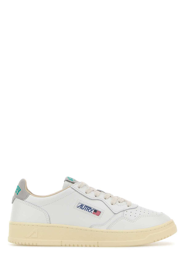 Autry Exterior: 100% Leather Interior: 100% Fabric Sole: Rubber sneaker in white
