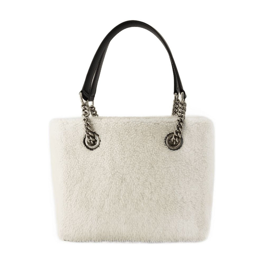Balenciaga Faux fur shoulder bag in beige