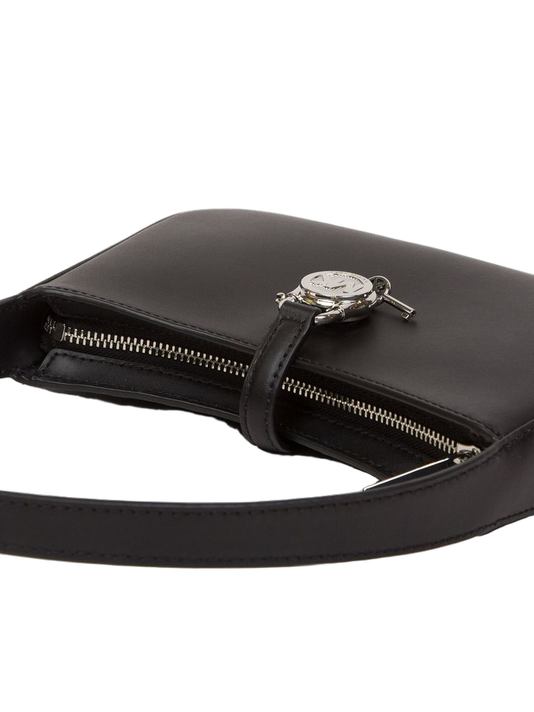Michael Kors 100% Leather; Lining: 100% Polyester clutch in black