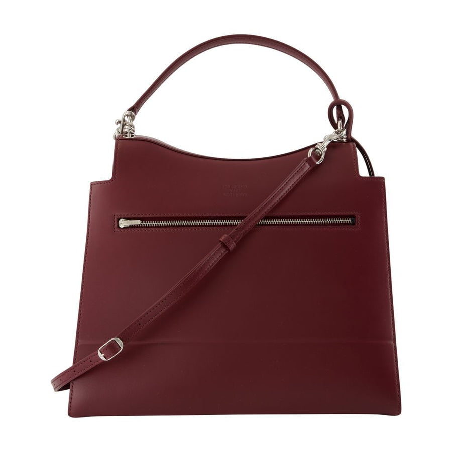 Balenciaga Lambskin top handle bag in burgundy