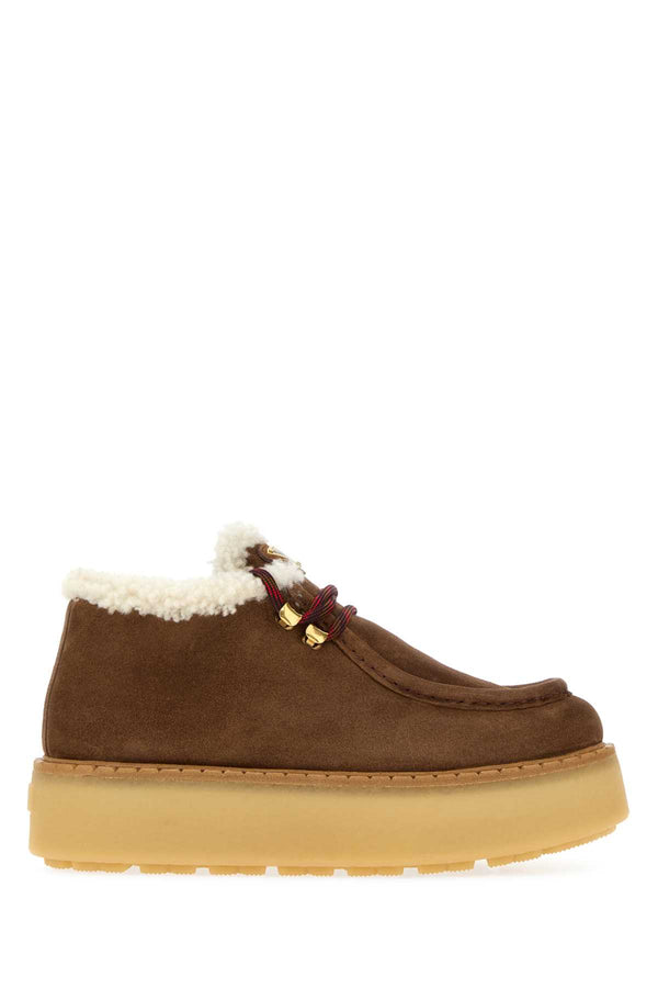 Prada 100% Vitello (calfskin) flat in brown