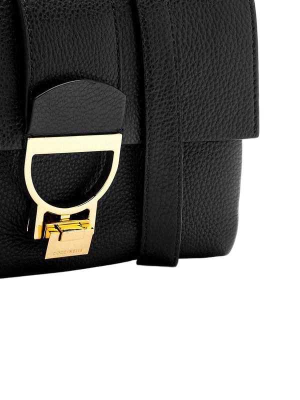Coccinelle 100% Cowhide (exterior); 56% Polyurethane top handle bag in black