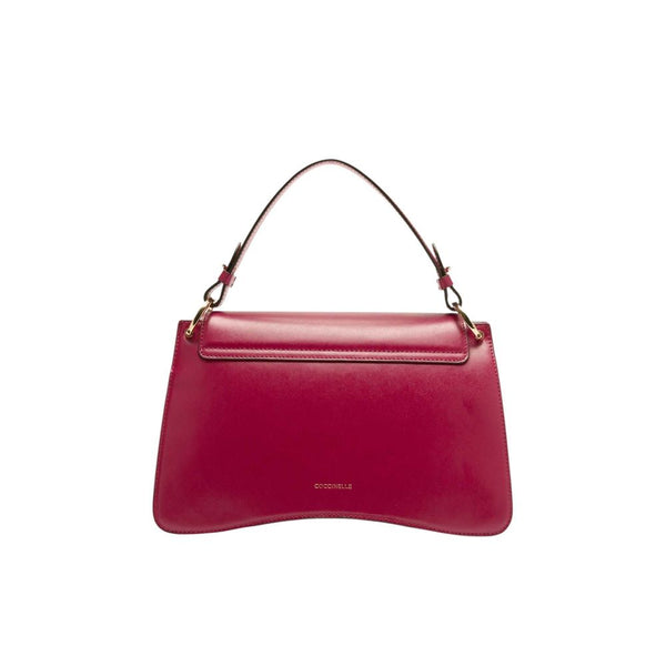 Coccinelle 100% Calf Split; Lining: 100% Cotton; Inside: 56% Polyurethane top handle bag in red