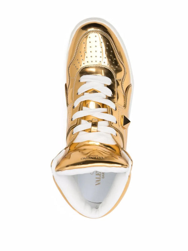 Valentino Leather high-top sneaker in gold