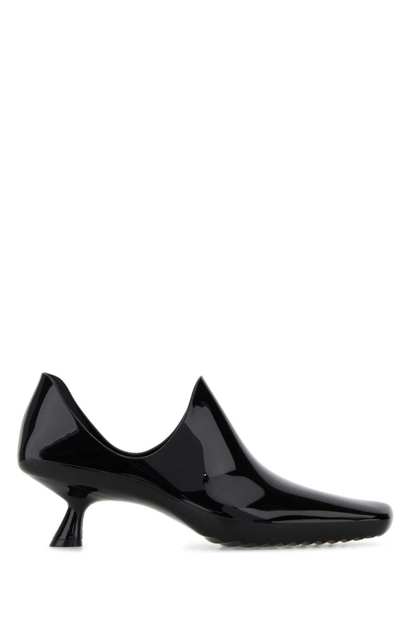 Loewe Exterior: 100% PVC; Interior: 100% Leather; Sole: Rubber heel in black