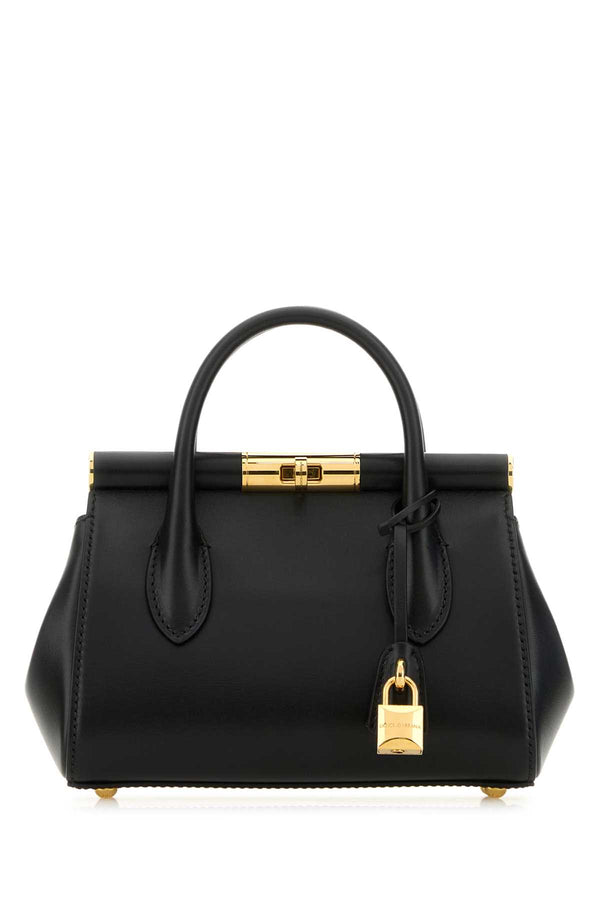 Dolce & Gabbana Exterior: 100% Calf Lining: 100% Lamb Finishing: Golden metal top handle bag in black
