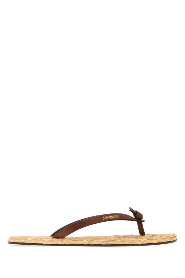 Saint Laurent Exterior: 100% Calf; Interior: 100% Raffia; Sole: Leather sandal in brown