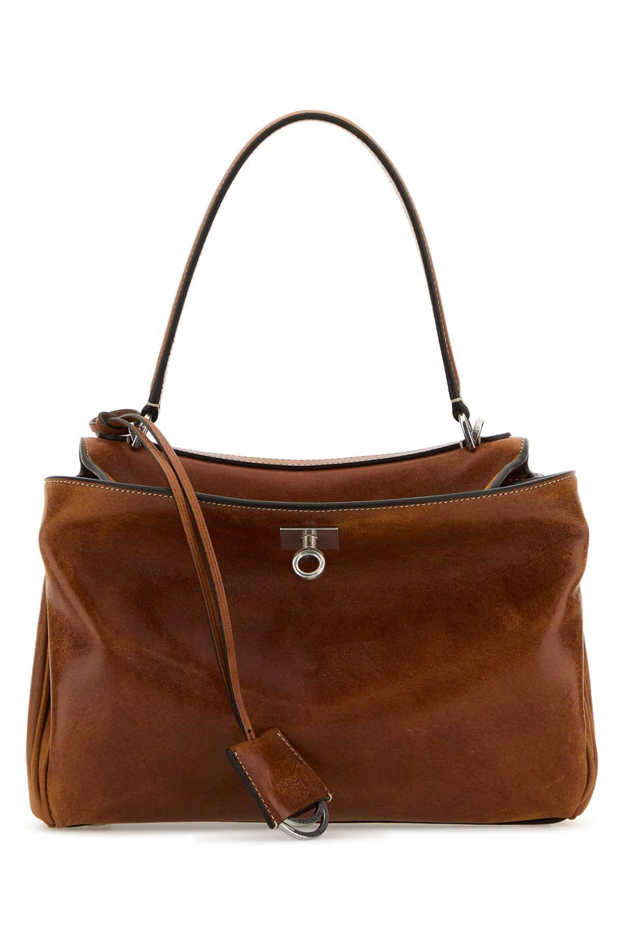 Balenciaga Handle Exterior: 100% Calf Lining: 100% Lamb Finishing: Antiqued golden metal top handle bag in brown