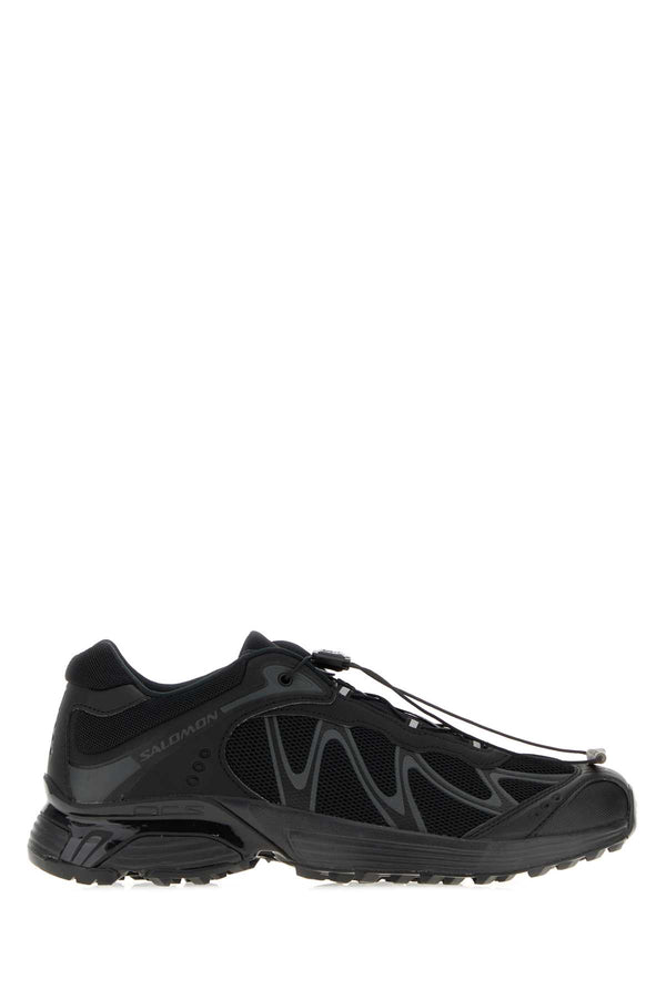Salomon Exterior: 100% Fabric; Interior: 100% Fabric; Sole: Rubber sneakers in black