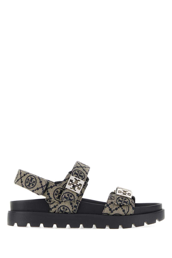 Tory Burch Monogram Exterior: 100% Fabric; Interior: 100% Leather; Sole: Rubber sandal in beige
