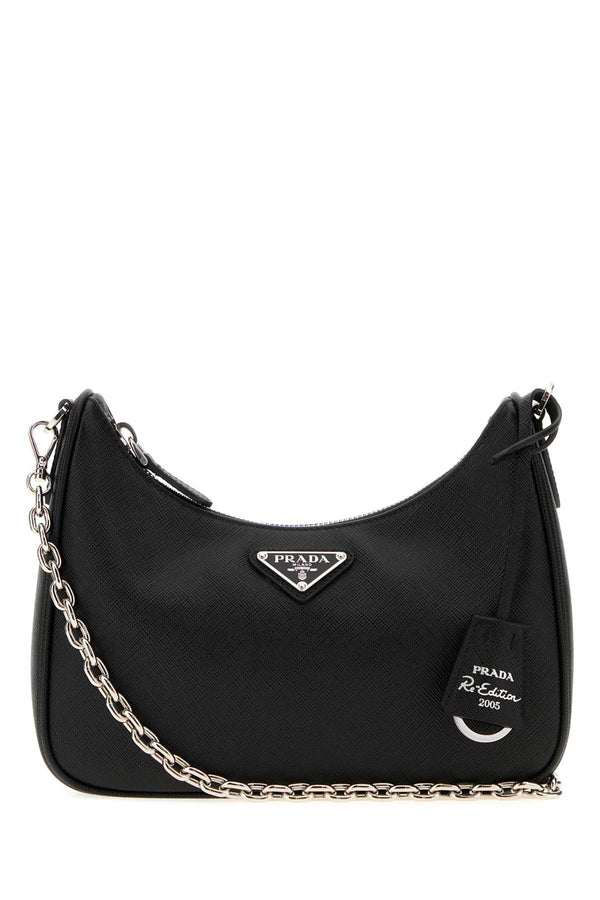 Prada Exterior: 100% Leather; Lining: 100% Fabric; Finishing: Silver metal shoulder bag in black