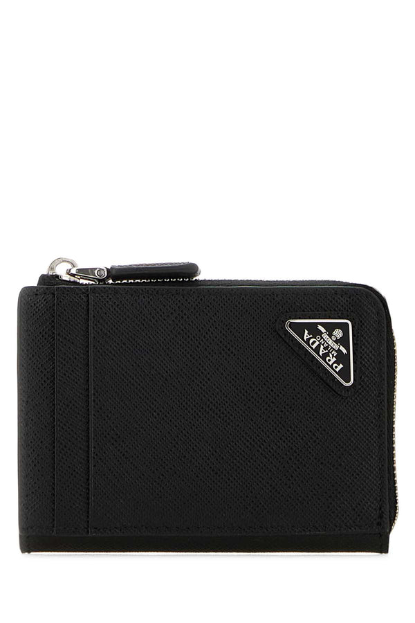 Prada Exterior: 100% Leather. Finishing: Silver metal wallet in black