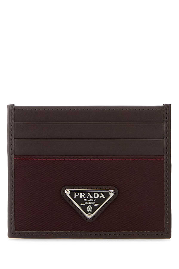 Prada Exterior: 100% Calf card case in burgundy