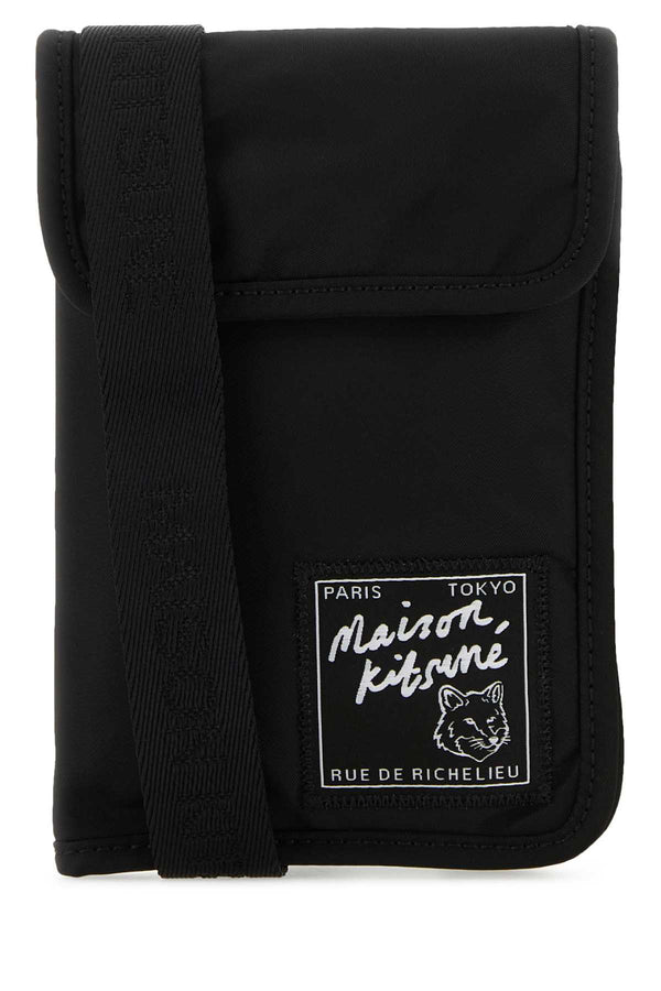 Maison Kitsune Exterior: 100% Nylon; Lining: 100% Nylon; Finishing: Silver metal card case in black