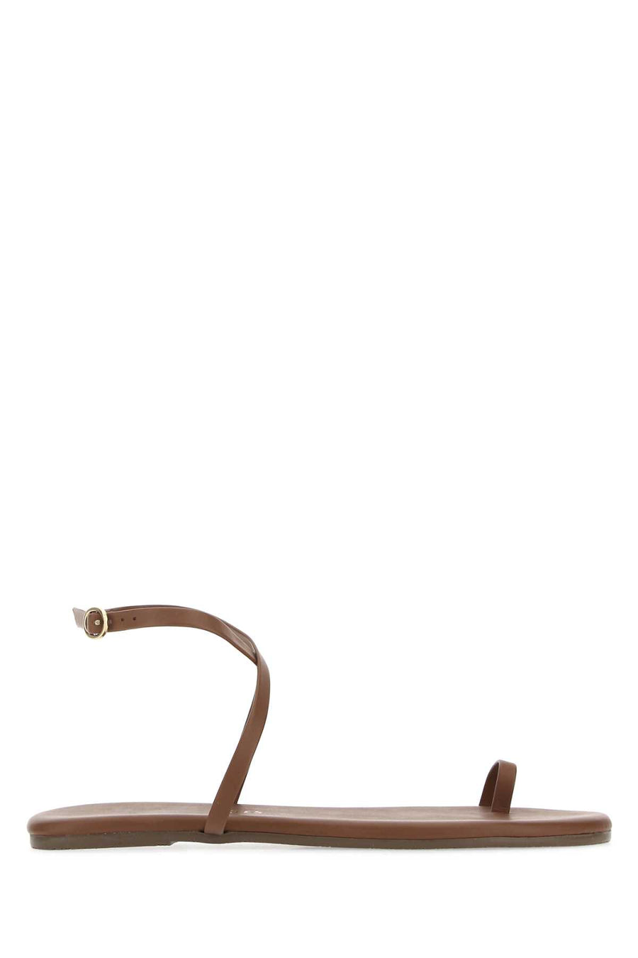 Tkees Exterior: 100% Bovine leather; Interior: 100% Bovine leather; Sole: Rubber sandal in brown