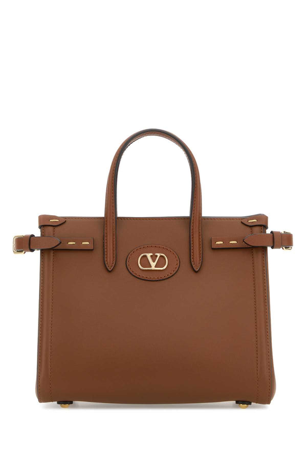 Valentino Garavani Exterior: 100% Leather top handle bag in brown