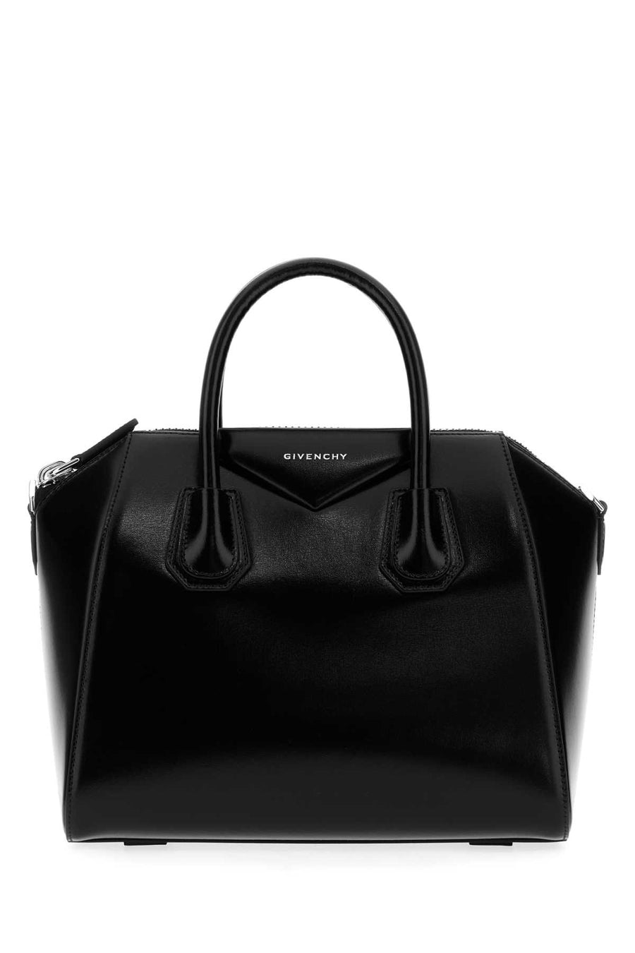 Givenchy Exterior: 100% Calf Lining: 100% Cotton Finishing: Silver metal top handle bag in black
