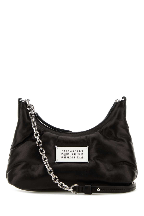 Maison Margiela Body: 100% sheepskin leather; Patch: 100% calfskin leather; Lining: 100% polyester; Interior: 100% sheepskin leather; Hardware: brass and zinc alloy shoulder bag in black
