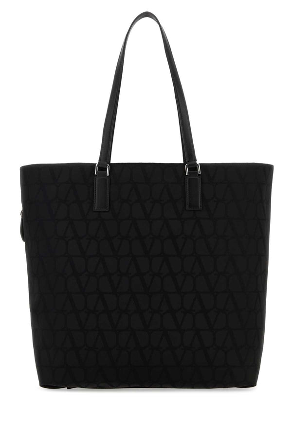 Valentino Garavani Exterior: 100% Fabric; Lining: 100% Fabric; Finishing: Palladium tote bag in black