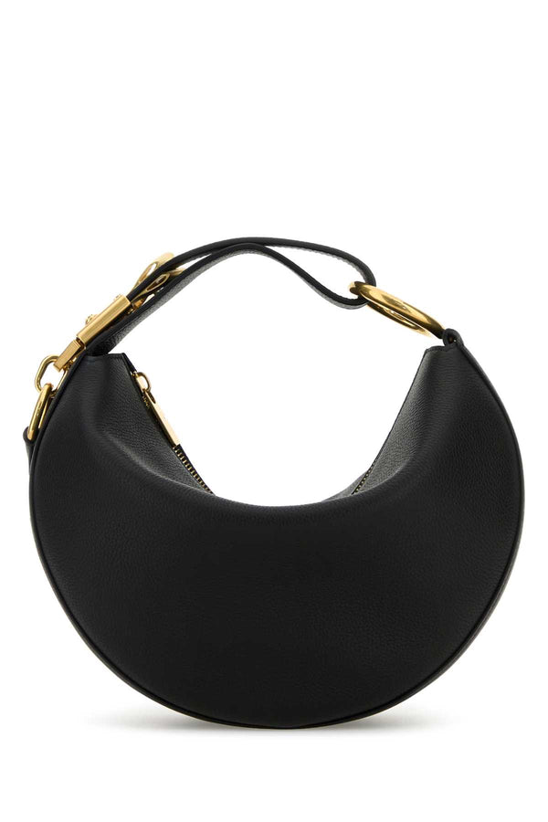 Burberry Exterior: 100% Calf; Lining: 100% Calf; Finishing: Antiqued golden metal shoulder bag in black