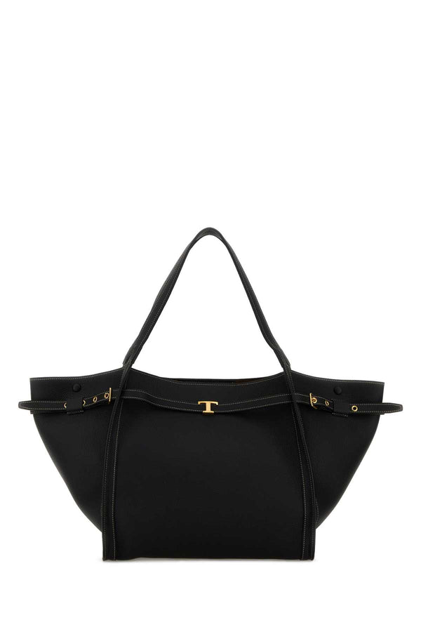 Tod's Exterior: 100% Leather; Lining: 100% Fabric; Finishing: Antiqued golden metal tote bag in black