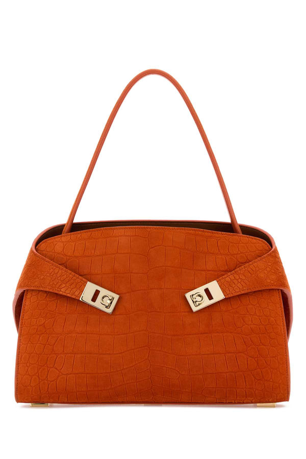 Ferragamo Siena Exterior: 100% Suede shoulder bag in orange