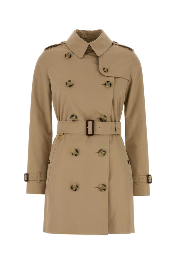 Burberry Exterior: 100% Cotton. Lining: 100% Cotton trench coat in beige
