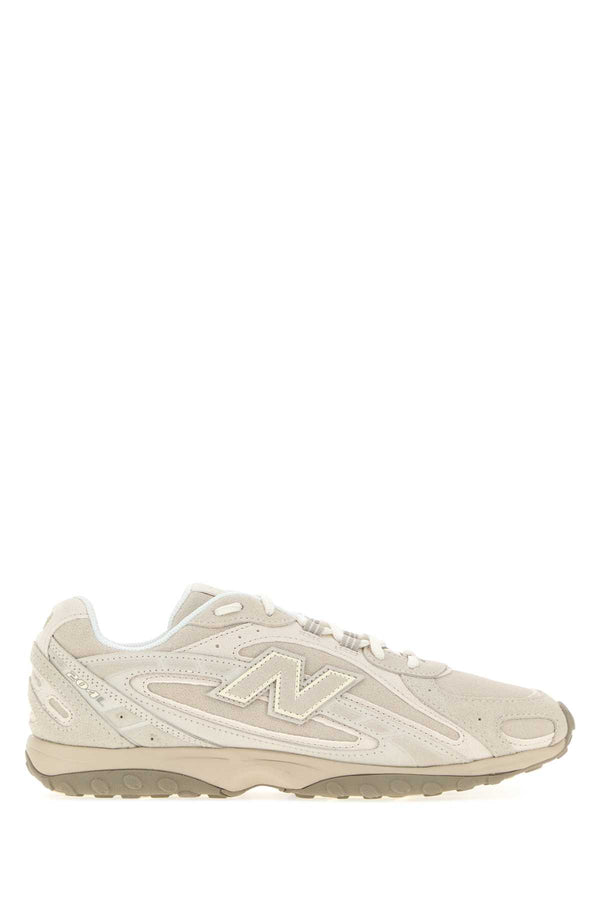 New Balance Exterior: 100% Suede; Interior: 100% Fabric; Sole: Rubber sneakers in beige