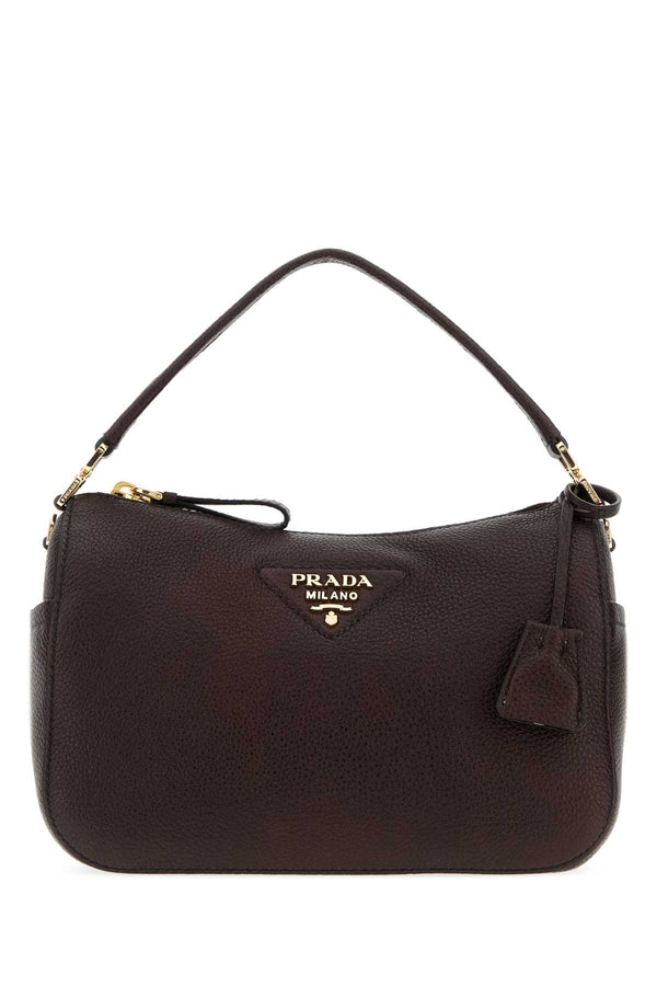 Prada Exterior: 100% Deer leather; Lining: 100% Textile; Hardware: Gold-tone metal shoulder bag in brown