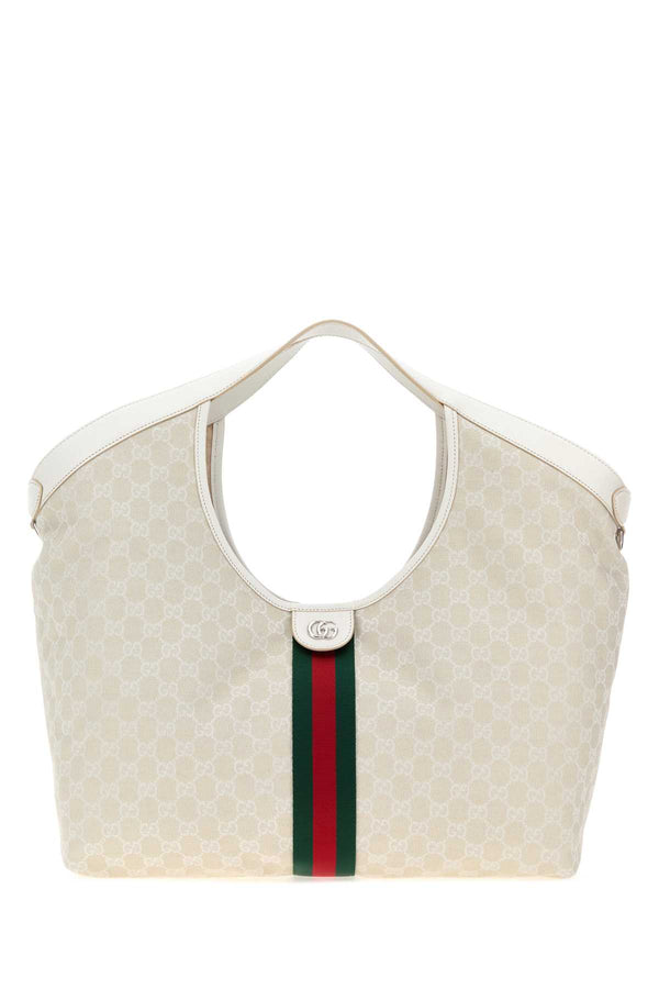 Gucci Ophidia Exterior: 100% Fabric; Lining: 100% Fabric; Finishing: Silver metal shoulder bag in beige