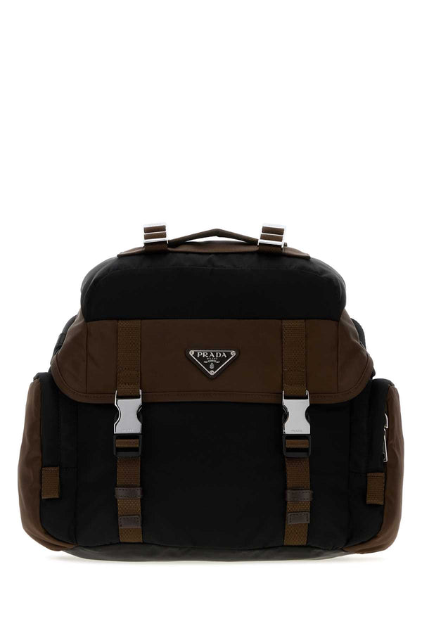Prada Exterior: 100% Fabric; Lining: 100% Fabric; Finishing: Silver metal crossbody bag in black