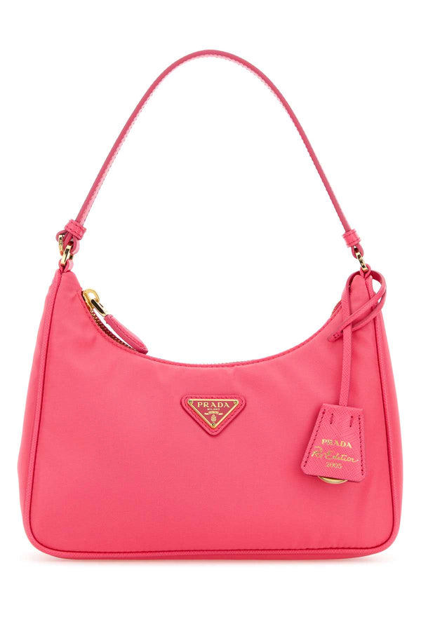 Prada Exterior: 100% Fabric; Lining: 100% Fabric; Finishing: Golden metal shoulder bag in pink