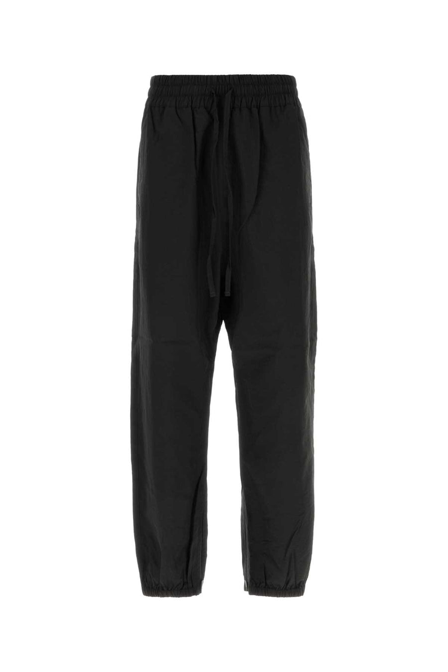 Fear Of God Track Exterior: 63% Recycled nylon 37% Nylon joggers in black