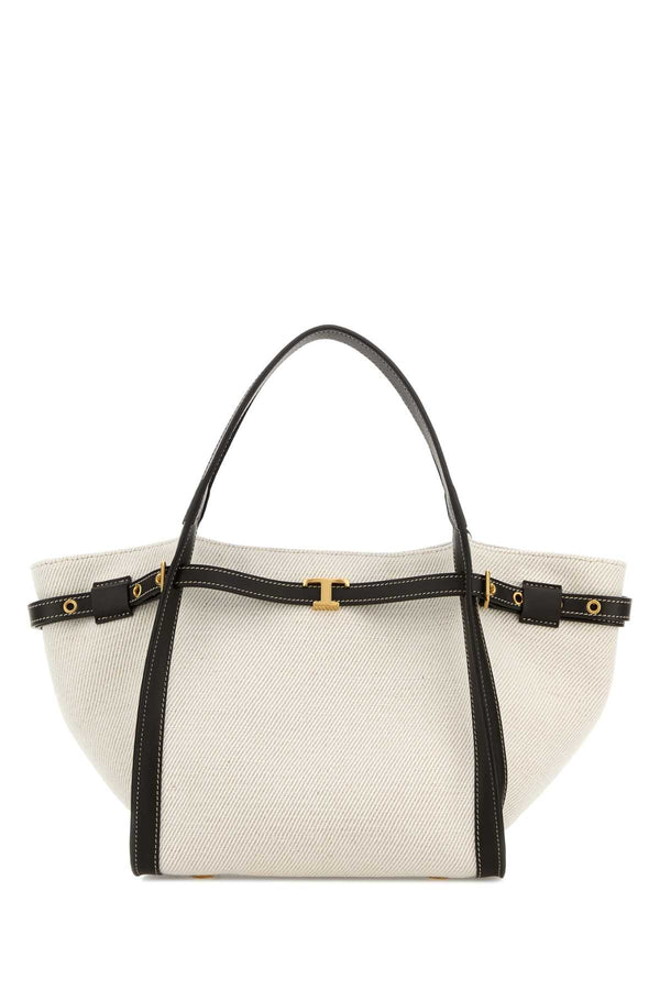 Tod's Shopping Exterior: 100% Fabric. Lining: 100% Fabric. Hardware: Antiqued golden metal tote bag in white