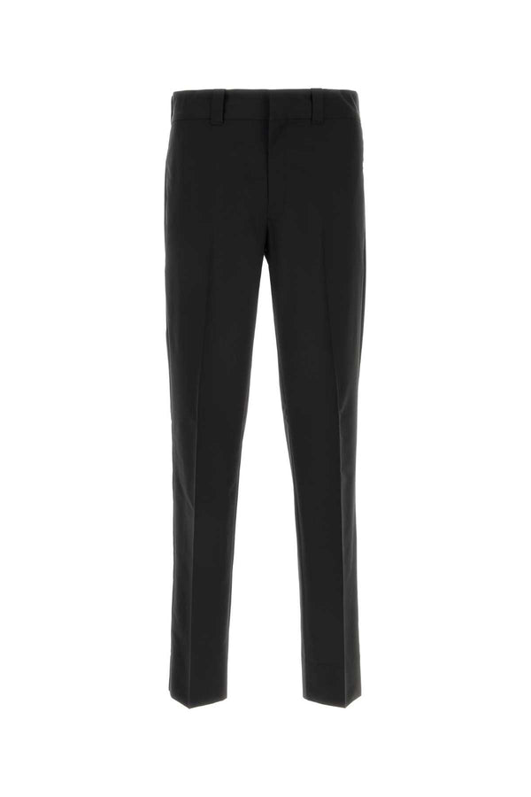 Prada 64% Virgin wool trousers in black