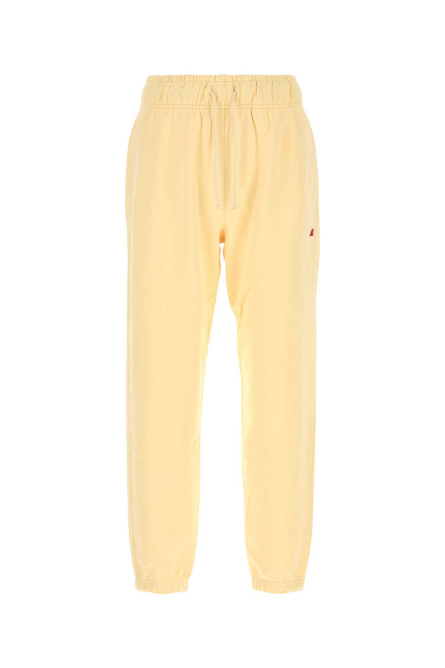 New Balance Core 100% Cotton joggers in yellow