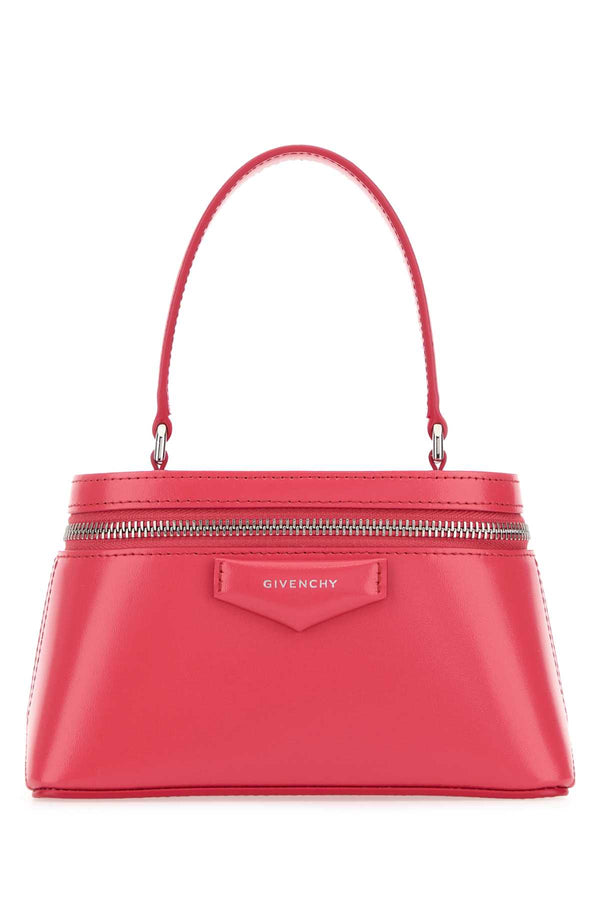 Givenchy Exterior: 100% Calf top handle bag in pink