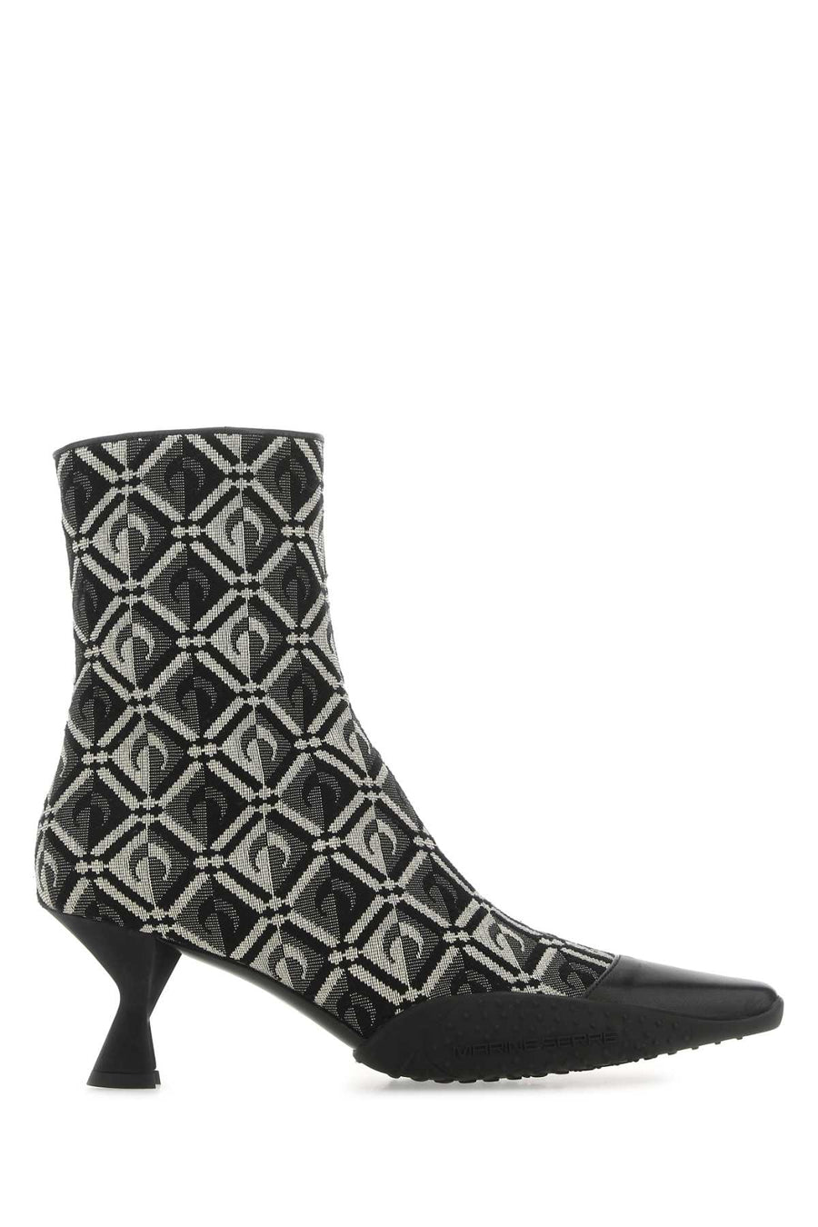 Marine Serre Exterior: 97% Cotton 3% Polyester; Interior: 100% Leather; Sole: Rubber boot in black