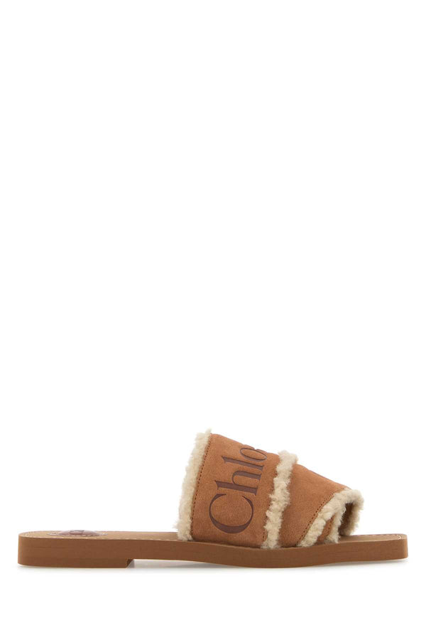 Chloé Woody Upper: 100% suede; Lining: 100% leather; Outer sole: 100% EVA; Inner sole: 95% EVA slippers in brown