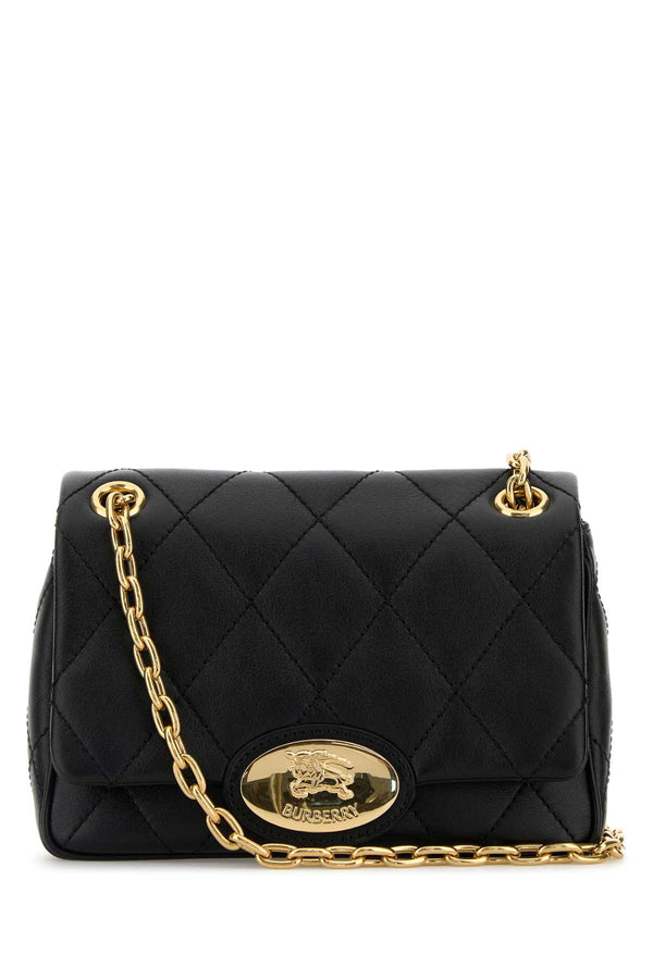 Burberry Exterior: 100% Calf. Lining: 100% Cotton. Finishing: Golden metal shoulder bag in black
