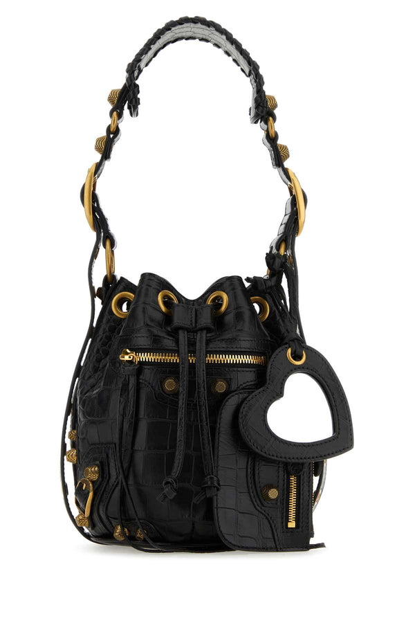 Balenciaga Exterior: 100% Calf Lining: 100% Cotton Finishing: Antiqued golden metal bucket bag in black
