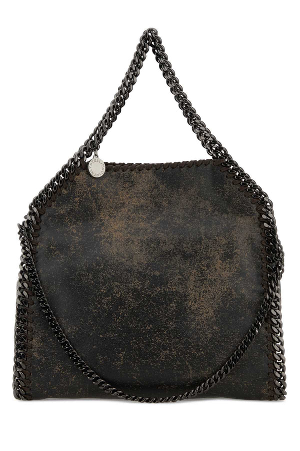 Stella McCartney Exterior: 100% Fabric; Lining: 100% Polyester; Finishing: Gunmetal shoulder bag in black