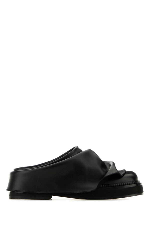 The Attico Sabot Exterior: 100% Calf leather mule in black