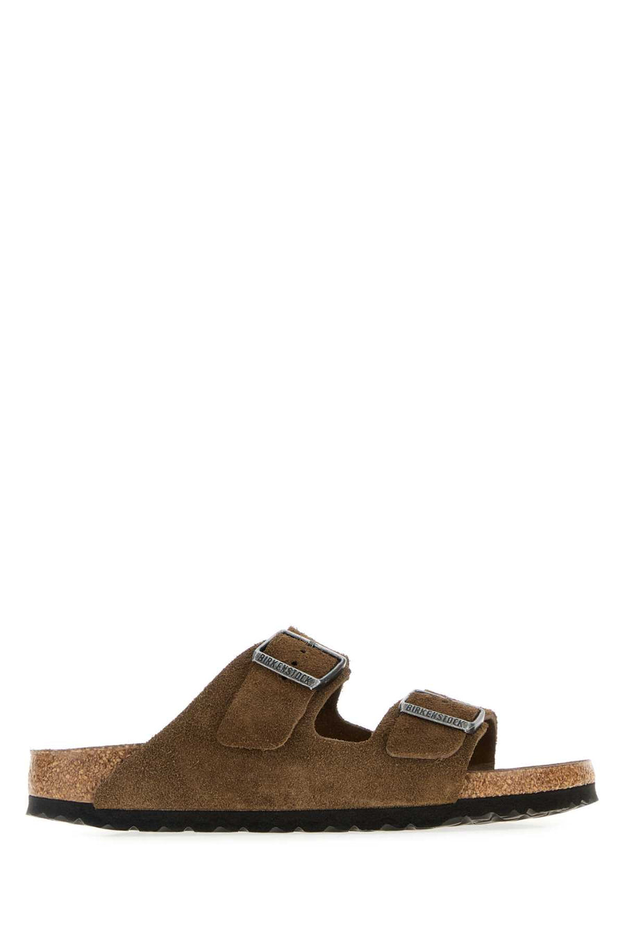 Birkenstock Dark Exterior: 100% Suede; Interior: 100% Suede; Sole: Rubber slipper in brown